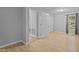Bedroom featuring a hardwood floors, natural light, and access to additional rooms at 627 Gaslight Trl, Wendell, NC 27591