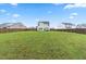Spacious, fenced backyard with lush green grass, perfect for outdoor activities and relaxation at 66 Arlie Ln, Lillington, NC 27546