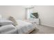 Cozy bedroom with a TV on a dresser, and a window with natural light at 66 Arlie Ln, Lillington, NC 27546