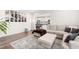 Cozy living room with a sectional sofa, a wooden coffee table, and a view of the modern kitchen at 66 Arlie Ln, Lillington, NC 27546