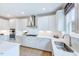 Spacious kitchen equipped with stainless appliances, white cabinets, and quartz countertops at 673 Sun Meadow Dr, Wake Forest, NC 27587