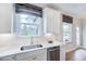Well-lit kitchen showcasing quartz counters, subway tile backsplash, and stainless appliances at 673 Sun Meadow Dr, Wake Forest, NC 27587