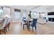 Bright and airy living space with fireplace, modern furnishings, and seamless flow into the kitchen at 673 Sun Meadow Dr, Wake Forest, NC 27587