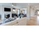 Elegant living room featuring a fireplace, modern decor, and an open floor plan with access to the dining area at 673 Sun Meadow Dr, Wake Forest, NC 27587