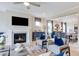 Inviting living room with a fireplace, neutral color scheme, comfortable seating, and an open layout at 673 Sun Meadow Dr, Wake Forest, NC 27587