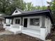 Charming single-story home with a welcoming front porch and fresh exterior paint at 722 Long Ave, Rocky Mount, NC 27801