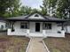 Charming single-story home with a welcoming front porch and fresh exterior paint at 722 Long Ave, Rocky Mount, NC 27801