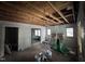 A spacious room featuring an open ceiling and natural light from multiple windows at 722 Long Ave, Rocky Mount, NC 27801