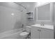 Bathroom with a shower-tub, toilet, sink, vanity, and decorative mirror at 8231 Allyns Landing Way # 101, Raleigh, NC 27615