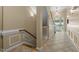 Hallway with tiled floors leading to an outdoor entrance at 8231 Allyns Landing Way # 101, Raleigh, NC 27615