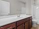 Bathroom featuring a vanity with drawers and cabinets, a sink, and a tub shower at 850 Apalachia Lake Dr, Fuquay Varina, NC 27526
