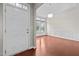 Inviting entryway with hardwood floors, white trim, and a chandelier at 850 Apalachia Lake Dr, Fuquay Varina, NC 27526