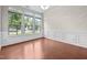 Bright and airy room with wainscoting, hardwood floors, and lots of light at 850 Apalachia Lake Dr, Fuquay Varina, NC 27526