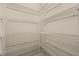 Walk-in pantry with sturdy wire shelving, providing ample storage space for food and kitchen essentials at 850 Apalachia Lake Dr, Fuquay Varina, NC 27526
