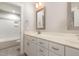 Modern bathroom with double sinks, granite countertops, and tiled shower at 90 Starwood Dr, Garner, NC 27529