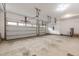This garage features two vehicle bays, concrete floors, and electric garage door openers at 90 Starwood Dr, Garner, NC 27529