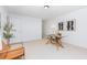 Neutral bedroom features a glass desk with modern decor, carpet, and neutral paint at 925 Spring Meadow Dr, Durham, NC 27713