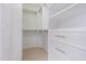 White walk-in closet provides ample shelving, drawers, and hanging storage at 925 Spring Meadow Dr, Durham, NC 27713