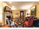 Comfortable living room with a fireplace, area rug, and classic decor at 1002 Vance St, Raleigh, NC 27608