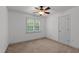 Cozy bedroom with carpet, a window with shutters, and a ceiling fan at 1012 Coram Fields Rd, Wake Forest, NC 27587