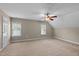 Large bonus room featuring neutral carpet and two windows at 1012 Coram Fields Rd, Wake Forest, NC 27587