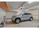 Attached garage with a SUV at 1012 Coram Fields Rd, Wake Forest, NC 27587