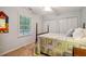 Bedroom with a large bed, carpet, window, and closet at 103 Red Cedar Pl, Chapel Hill, NC 27514