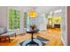 Welcoming foyer with hardwood floors, abundant natural light, and a view of the living room at 103 Red Cedar Pl, Chapel Hill, NC 27514