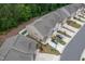 Aerial view of townhomes showcasing landscaping, driveways, and community layout at 1048 Flagler St, Durham, NC 27713