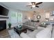 Open-concept living room flowing into the kitchen and dining area with lots of natural light at 1048 Flagler St, Durham, NC 27713