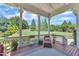 Covered back porch featuring a seating area and a view of the backyard at 105 Somerley Dr, Garner, NC 27529