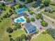Community aerial view showing the pool, clubhouse, tennis courts, and homes at 105 Somerley Dr, Garner, NC 27529