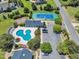 Community aerial of the pool, clubhouse, parking, and tennis court at 105 Somerley Dr, Garner, NC 27529