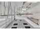 Spacious garage with epoxy flooring and ceiling mounted storage racks at 105 Somerley Dr, Garner, NC 27529