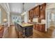Well-appointed kitchen with granite countertops, a large island, stainless steel appliances, and a breakfast nook at 105 Somerley Dr, Garner, NC 27529