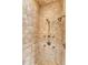 Tiled walk-in shower with a handheld showerhead at 105 Somerley Dr, Garner, NC 27529