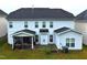 The backyard features a screened porch and a small patio area at 110 Elmsford St, Durham, NC 27707