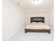 Bedroom featuring a bed with an upholstered headboard at 110 Elmsford St, Durham, NC 27707