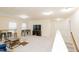 Bonus room featuring foosball table, television, and seating at 110 Elmsford St, Durham, NC 27707