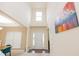 Grand foyer with soaring ceilings and a front door with sidelights at 110 Elmsford St, Durham, NC 27707