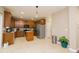 Bright and open kitchen with stainless steel appliances, an island, and sliding doors to the outside at 110 Elmsford St, Durham, NC 27707
