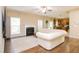 Inviting living room featuring a fireplace, sleek floors, and an open layout connecting to the kitchen at 110 Elmsford St, Durham, NC 27707