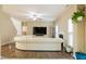 Bright living room with a cozy fireplace, a display cabinet, and lots of space for entertaining guests at 110 Elmsford St, Durham, NC 27707