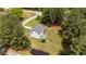 Aerial image highlighting the home's backyard, patio, and the surrounding wooded landscape at 11233 Jeffreys Ln, Wake Forest, NC 27587