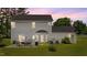 Spacious backyard with a patio, outdoor seating, and well-maintained lawn at 11233 Jeffreys Ln, Wake Forest, NC 27587