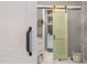 Bathroom featuring a cabinet with a sliding slat door at 11233 Jeffreys Ln, Wake Forest, NC 27587