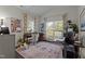 Inviting home office with neutral walls, large windows, and a patterned rug at 11233 Jeffreys Ln, Wake Forest, NC 27587