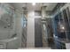 Spacious walk-in shower with double showerheads and decorative shelving at 11233 Jeffreys Ln, Wake Forest, NC 27587