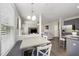 Open concept view of the kitchen, dining nook and living room for easy entertaining and gathering at 1211 Whispering Oak Ln, Durham, NC 27704