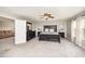 Spacious main bedroom with carpet, large dark-wood bed, dresser, and ceiling fan at 1211 Whispering Oak Ln, Durham, NC 27704